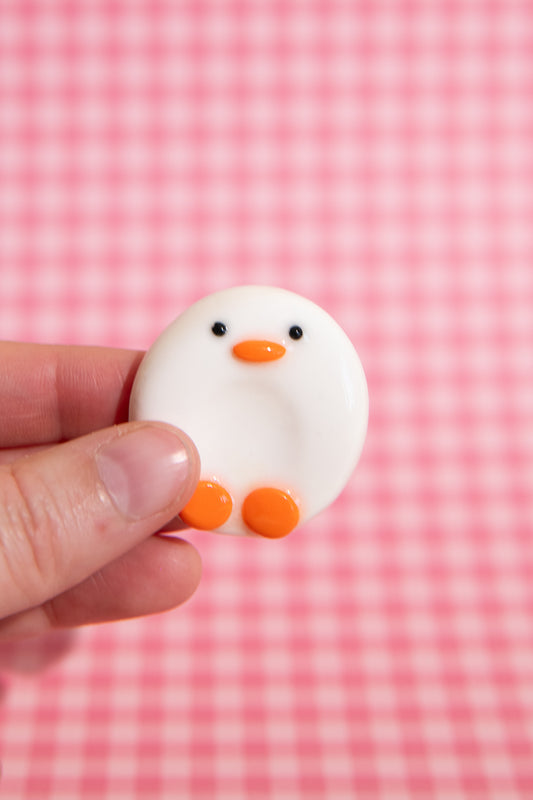 Gans Fidget Toy Sorgenstein mit Resin Überzug für glatte glänzende Oberfläche und Entspannung